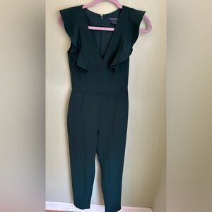 French Connection sleeveless jumpsuit w/deep V neck /ruffle. Deep Green Sz 4.